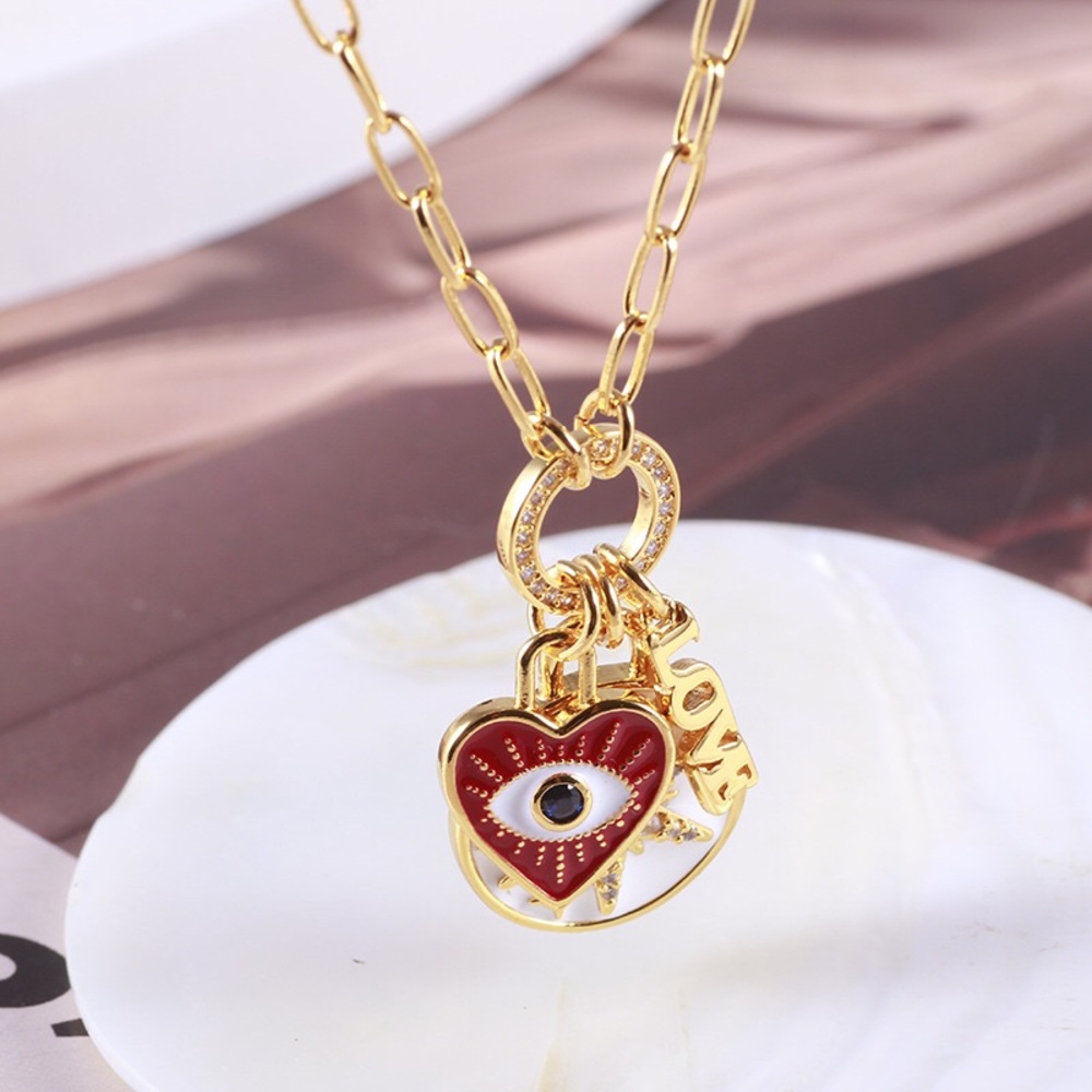 Kate Spade Enamel Starburst Disc Necklace with Heart and Evil Eye Design